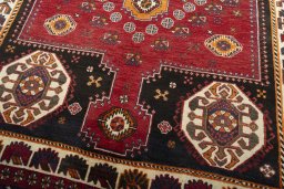 Close-up detail of 2000s Shiraz rug from Iran / Persia showing Wool weave