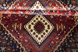 Full view of 2000s Shiraz rug from Iran / Persia, 190 × 118 cm in Red tones