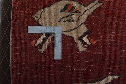 Corner detail of 2000s Shiraz rug showing border pattern and Wool pile
