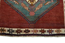 Central medallion detail of 2000s Shiraz rug from Iran / Persia