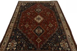 Surface texture of 2000s Shiraz rug with natural Wool and intricate pattern