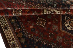 Full view of 2000s Shiraz rug from Iran / Persia, 267 × 177 cm in Red tones