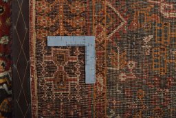 Surface texture of 2000s Shiraz rug with natural Wool and intricate pattern