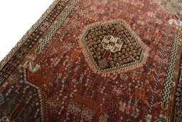 Backside of handmade 2000s Shiraz rug showing knot structure and weave density