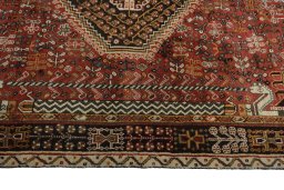 Full view of 2000s Shiraz rug from Iran / Persia, 245 × 155 cm in Red tones