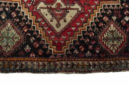 Close-up detail of 1970s Shiraz rug from Iran / Persia showing Wool weave