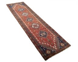 Close-up detail of 2000s Shiraz rug from Iran / Persia showing Wool weave