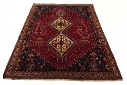 Surface texture of 2000s Shiraz rug with natural Wool and intricate pattern