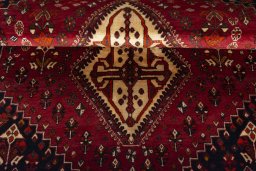 Full view of 2000s Shiraz rug from Iran / Persia, 203 × 138 cm in Red tones