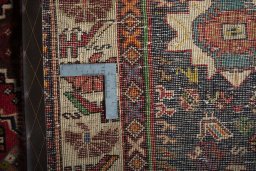 Close-up detail of 2000s Shiraz rug from Iran / Persia showing Wool weave