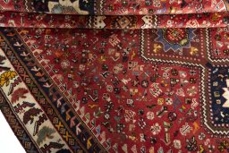 Full view of 2000s Shiraz rug from Iran / Persia, 282 × 203 cm in Red tones
