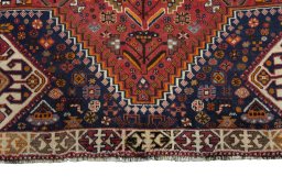 Close-up detail of 2000s Shiraz rug from Iran / Persia showing Wool weave