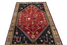 Surface texture of 2000s Shiraz rug with natural Wool and intricate pattern