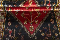 Full view of 2000s Shiraz rug from Iran / Persia, 216 × 133 cm in Red tones