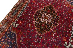 Backside of handmade 2000s Shiraz rug showing knot structure and weave density