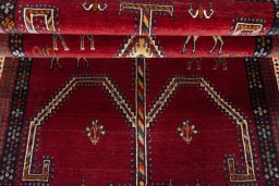 Corner detail of 2000s Shiraz rug showing border pattern and Wool pile