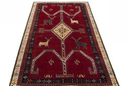 Surface texture of 2000s Shiraz rug with natural Wool and intricate pattern