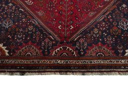 Full view of 2000s Shiraz rug from Iran / Persia, 340 × 225 cm in Red tones