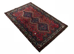 Close-up detail of 2000s Shiraz rug from Iran / Persia showing Wool weave