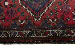 Central medallion detail of 2000s Shiraz rug from Iran / Persia