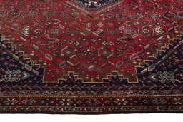 Corner detail of 1970s Shiraz rug showing border pattern and Wool pile