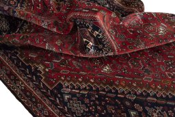 Surface texture of 1970s Shiraz rug with natural Wool and intricate pattern