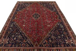 Surface texture of 1970s Shiraz rug with natural Wool and intricate pattern