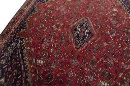 Backside of handmade 1970s Shiraz rug showing knot structure and weave density