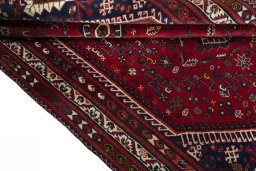 Close-up detail of 2000s Shiraz rug from Iran / Persia showing Wool weave