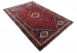 Close-up detail of 2000s Shiraz rug from Iran / Persia showing Wool weave