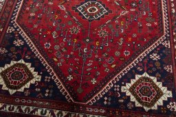 Close-up detail of 2000s Shiraz rug from Iran / Persia showing Wool weave