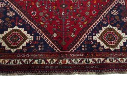 Full view of 2000s Shiraz rug from Iran / Persia, 267 × 182 cm in Red tones