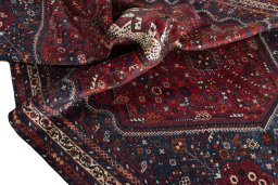 Surface texture of 1970s Shiraz rug with natural Wool and intricate pattern