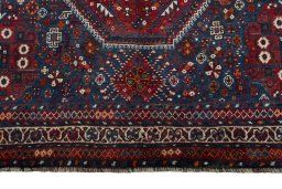 Full view of 1970s Shiraz rug from Iran / Persia, 282 × 180 cm in Red tones