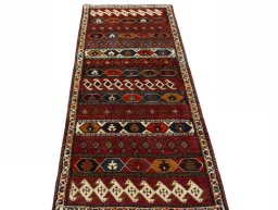 Surface texture of 2000s Shiraz rug with natural Wool and intricate pattern
