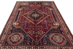 Surface texture of 2000s Shiraz rug with natural Wool and intricate pattern