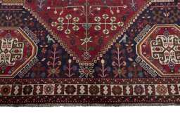 Full view of 2000s Shiraz rug from Iran / Persia, 293 × 210 cm in Red tones