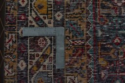 Surface texture of 2000s Shiraz rug with natural Wool and intricate pattern