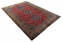 Close-up detail of 2000s Shiraz rug from Iran / Persia showing Wool weave
