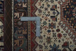 Close-up detail of 2000s Shiraz rug from Iran / Persia showing Wool weave