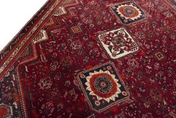 Backside of handmade 2000s Shiraz rug showing knot structure and weave density