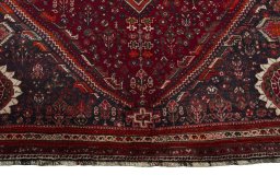 Full view of 2000s Shiraz rug from Iran / Persia, 323 × 211 cm in Red tones