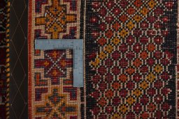 Surface texture of 2000s Shiraz rug with natural Wool and intricate pattern