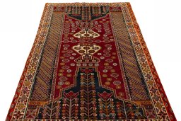 Surface texture of 2000s Shiraz rug with natural Wool and intricate pattern