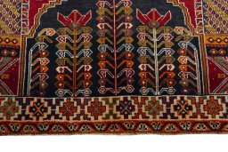 Close-up detail of 2000s Shiraz rug from Iran / Persia showing Wool weave