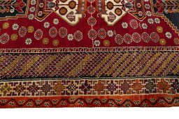Full view of 2000s Shiraz rug from Iran / Persia, 251 × 150 cm in Red tones
