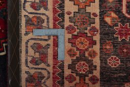 Surface texture of 2000s Shiraz rug with natural Wool and intricate pattern