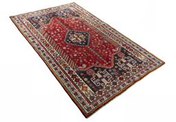 Close-up detail of 2000s Shiraz rug from Iran / Persia showing Wool weave
