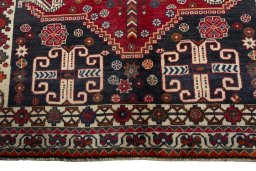 Close-up detail of 2000s Shiraz rug from Iran / Persia showing Wool weave