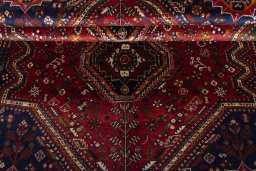 Corner detail of 2000s Shiraz rug showing border pattern and Wool pile